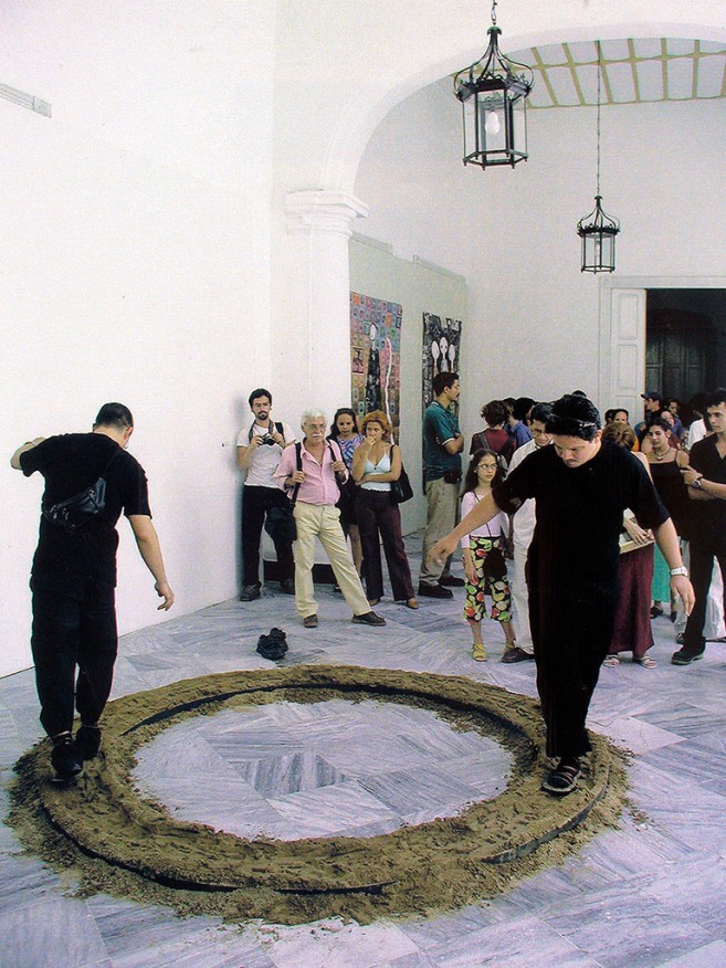 Equilibrium, 1998-2002 / Performance and cast bronze object, sand and steel / Dimensions variable